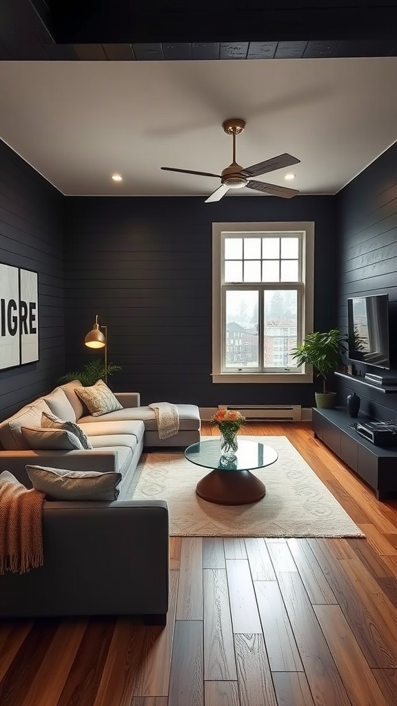 A living room with black shiplap walls, featuring a cozy couch, a large window, and creative lighting solutions.