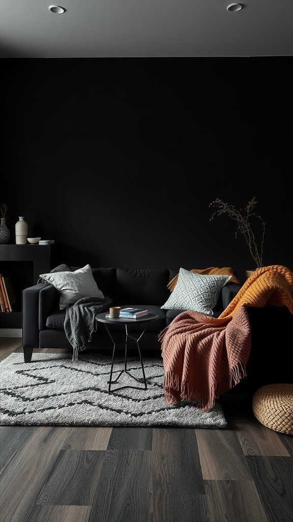 A stylish black living room featuring a black sofa, layered textiles, and a patterned rug.