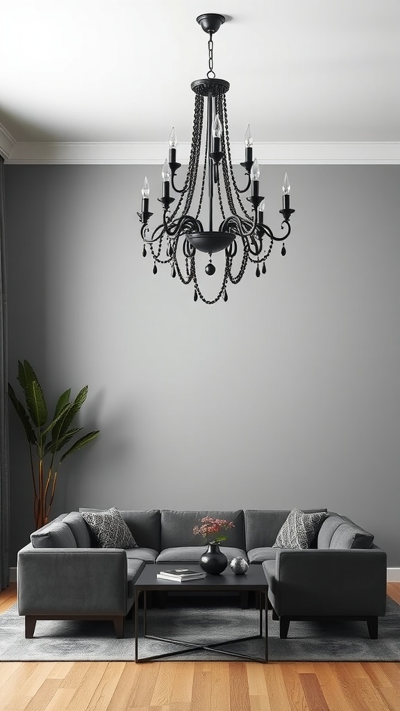 A black chandelier hanging in a grey living room with a grey sectional sofa and a coffee table.