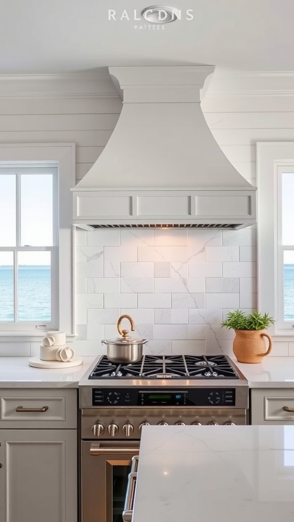 A stylish beach house kitchen featuring a modern range hood and an ocean view.