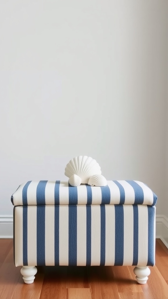 A nautical themed storage ottoman with blue and white stripes and a decorative shell on top.